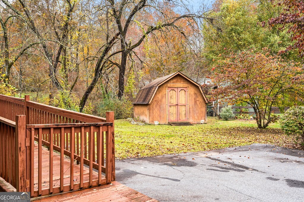 251 Rivers Edge Drive Hayesville, NC 28904 - Photo 44 of 45 a view of a wooden fence and a trees