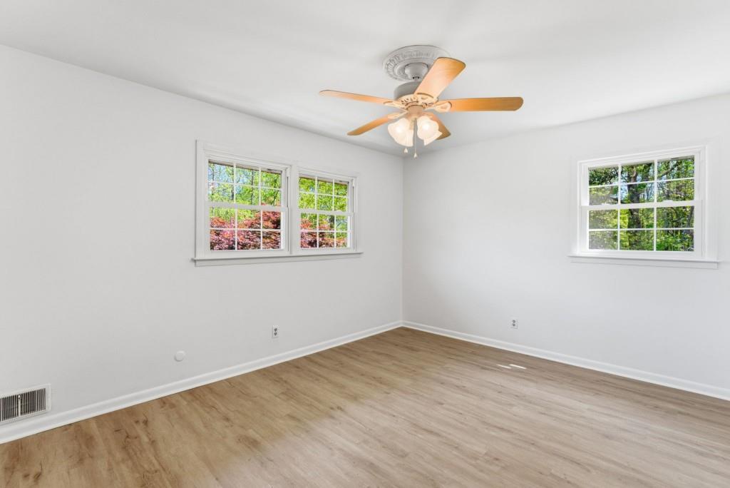 224 Old Franklin Street Roopville, GA 30170 - Photo 38 of 60 wooden floor in an empty room with a window