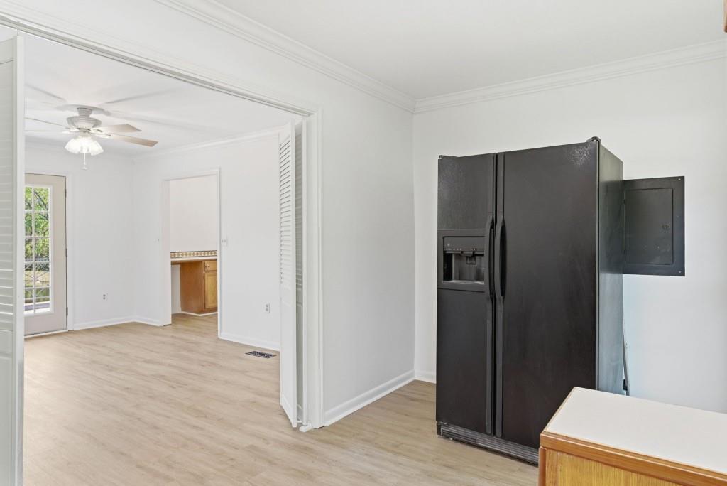 224 Old Franklin Street Roopville, GA 30170 - Photo 56 of 60 a view of a kitchen with refrigerator cabinet and a sink