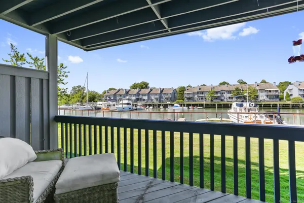 a balcony with view of outdoor space