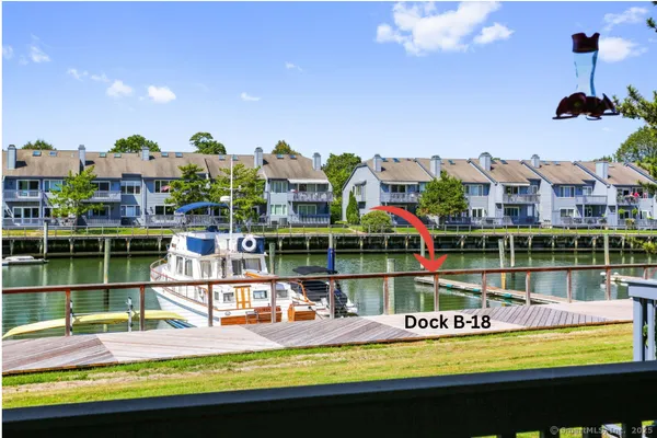 a view of a lake with a building in the background