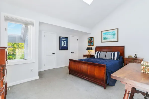 a view of a livingroom with furniture and window