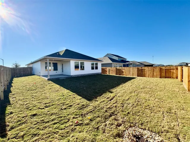 a view of a house with a swimming pool
