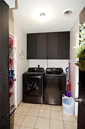 a kitchen with a stove and a refrigerator