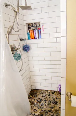 a bathroom with a sink a vanity and a mirror