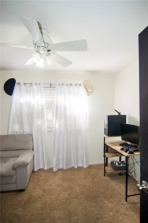 a room with furniture and flat screen tv