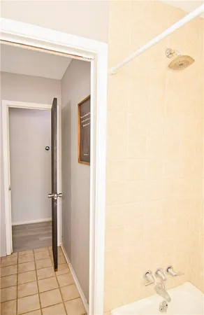 a bathroom with a toilet a sink and a mirror