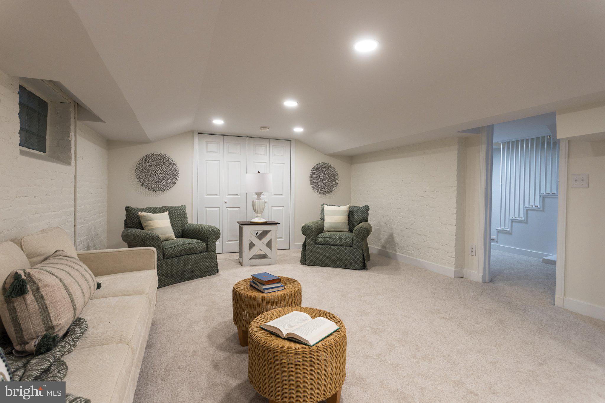 7005 Copeleigh Road Baltimore, MD 21212 - Photo 46 of 51 Cozy basement retreat with soft lighting.