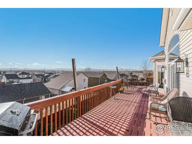 a view of balcony with furniture
