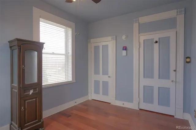 an empty room that has a window