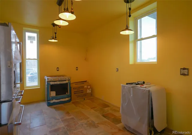 a view of a livingroom with furniture