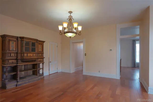 a view of a livingroom with wooden floor
