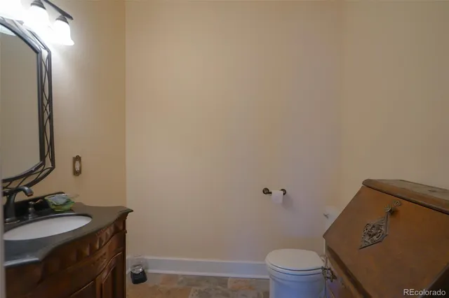 a bathroom with a sink and a toilet