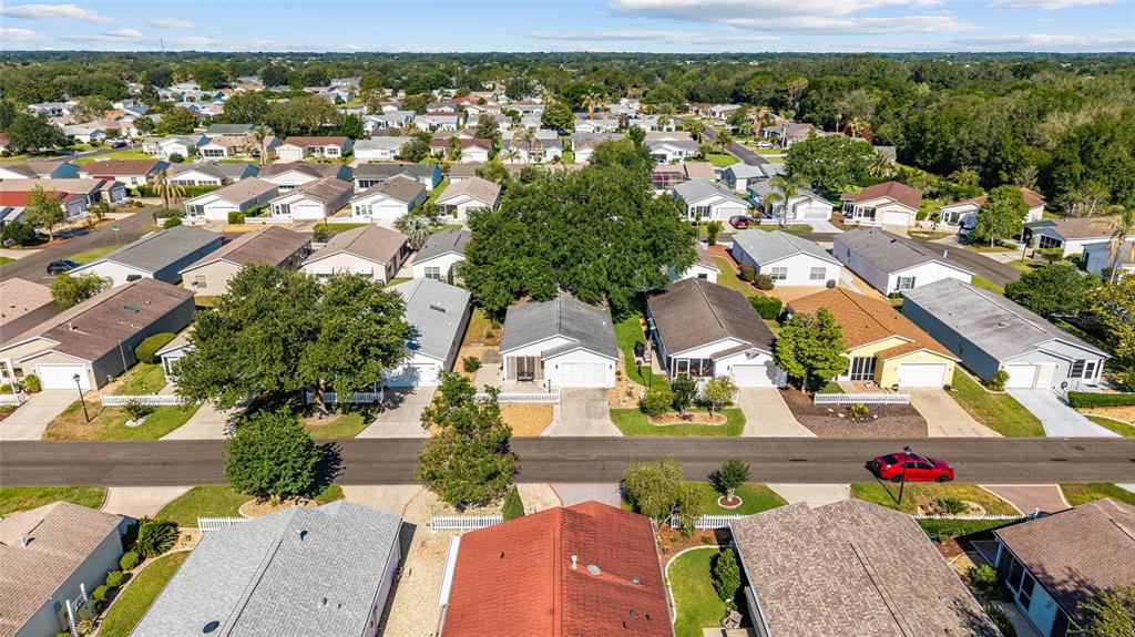 1710 Rosales Road The Villages, FL 32162 - Photo 20 of 23 an aerial view of residential houses with outdoor space