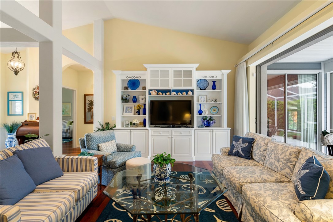 780 Timber Ridge Trail Southwest Vero Beach, FL 32962 - Photo 3 of 36 a living room with furniture and a flat screen tv