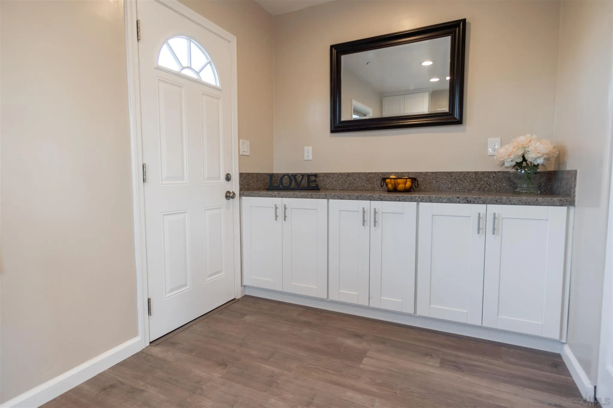7204 Waite Drive La Mesa, CA 91941 - Photo 7 of 18 a view of an entryway with wooden floor