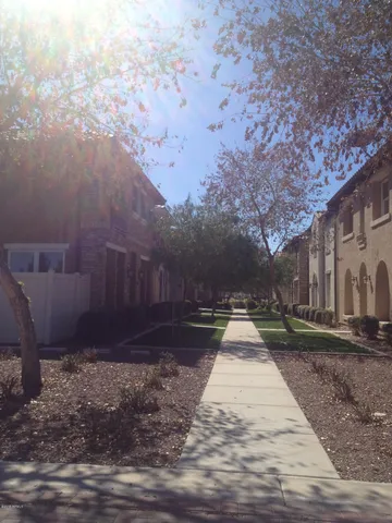 a view of a yard with trees
