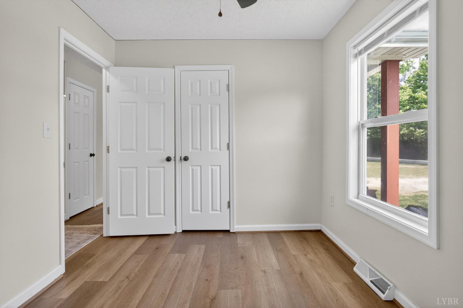5981-3 3 Creeks Road Gladys, VA 24554 - Photo 21 of 37 a view of a room with wooden floor and window