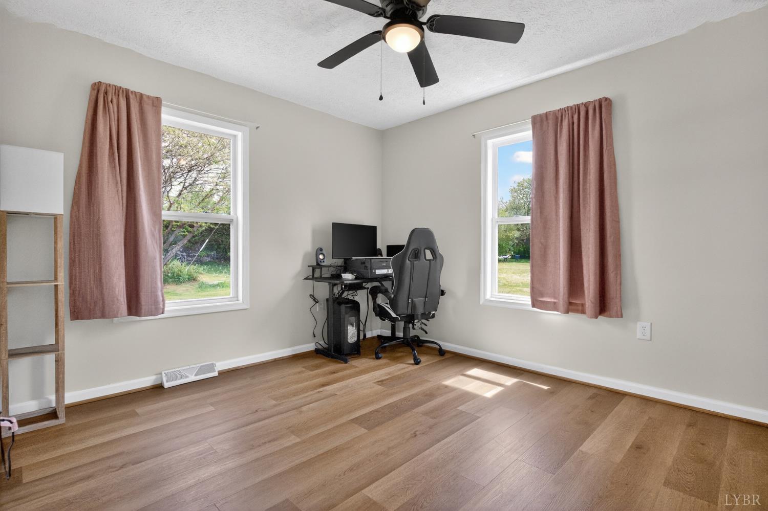 5981-3 3 Creeks Road Gladys, VA 24554 - Photo 22 of 37 a view of a workspace with furniture and a window
