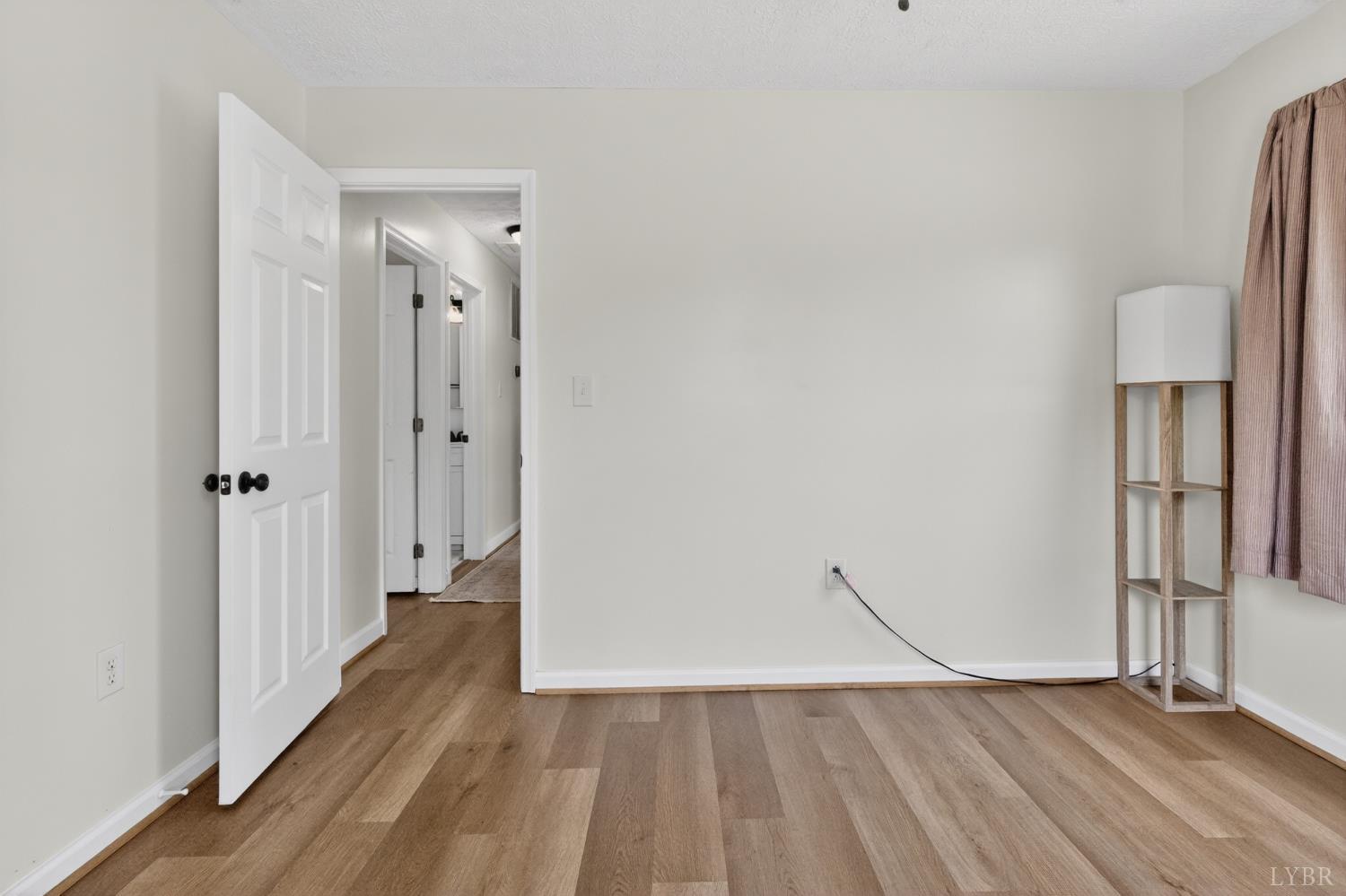 5981-3 3 Creeks Road Gladys, VA 24554 - Photo 24 of 37 a view of hallway with wooden floor