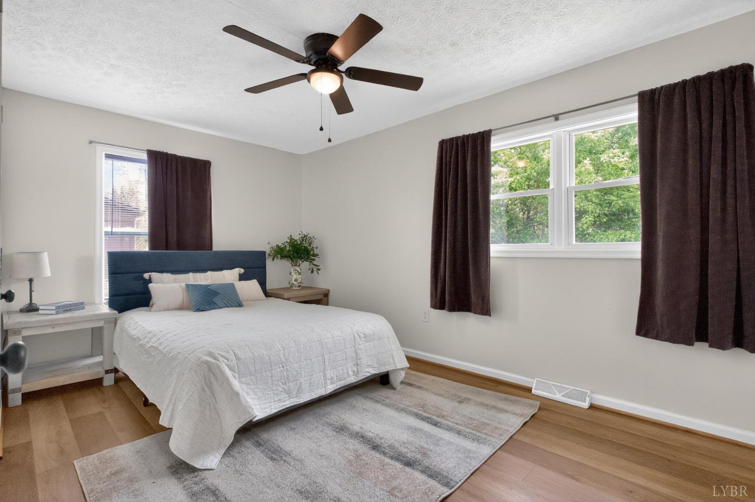 5981-3 3 Creeks Road Gladys, VA 24554 - Photo 25 of 37 a bedroom with a large bed and a window