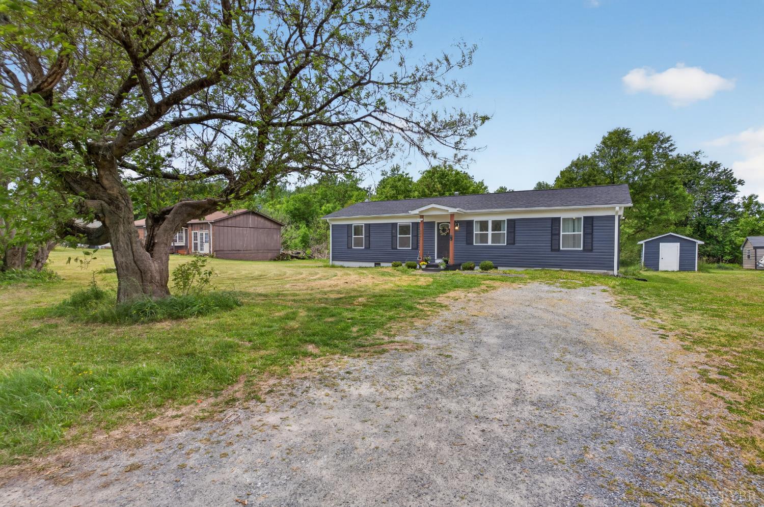 5981-3 3 Creeks Road Gladys, VA 24554 - Photo 29 of 37 front view of a house with a yard