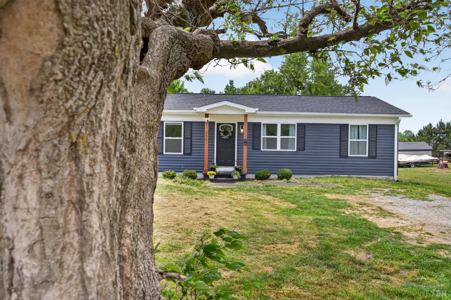 5981-3 3 Creeks Road Gladys, VA 24554 - Photo 30 of 37 front view of a house with a yard