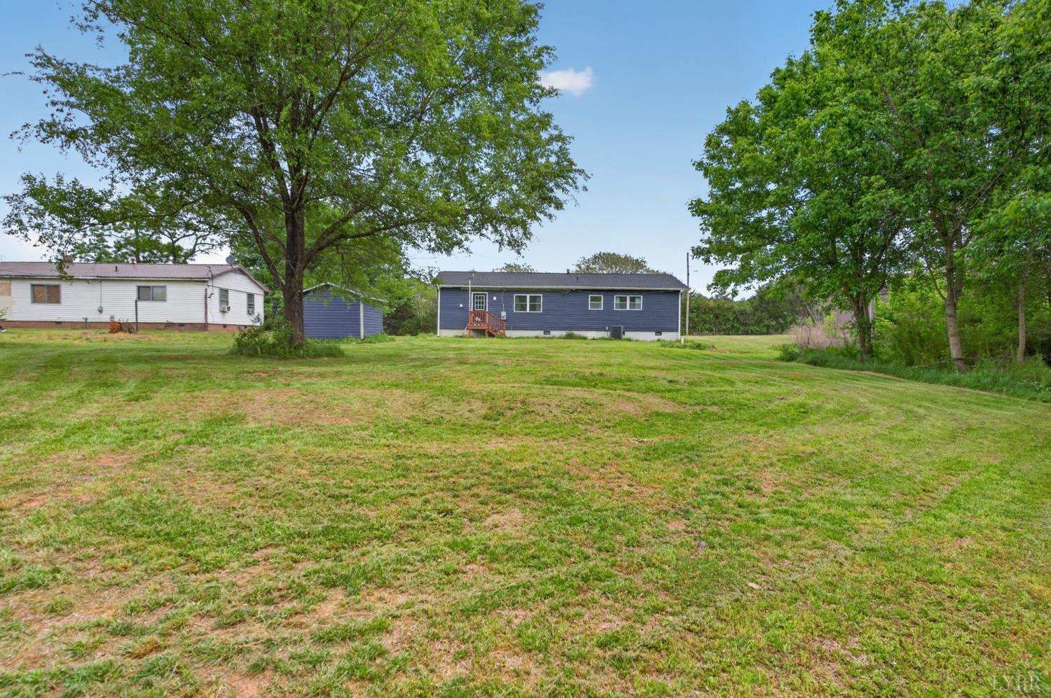 5981-3 3 Creeks Road Gladys, VA 24554 - Photo 36 of 37 a view of a big yard with a house