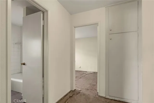 a view of a bathroom from the hallway