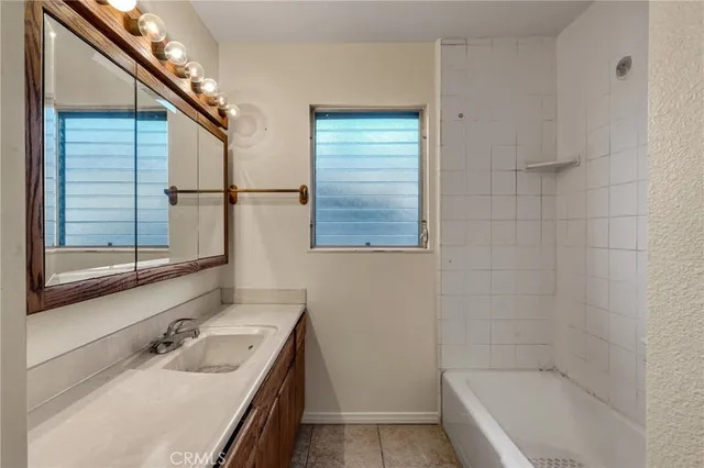 a bathroom with a sink and a bathtub