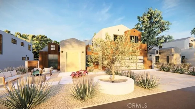 a view of a living room and kitchen