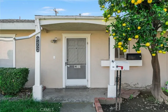 a front view of a house with yard
