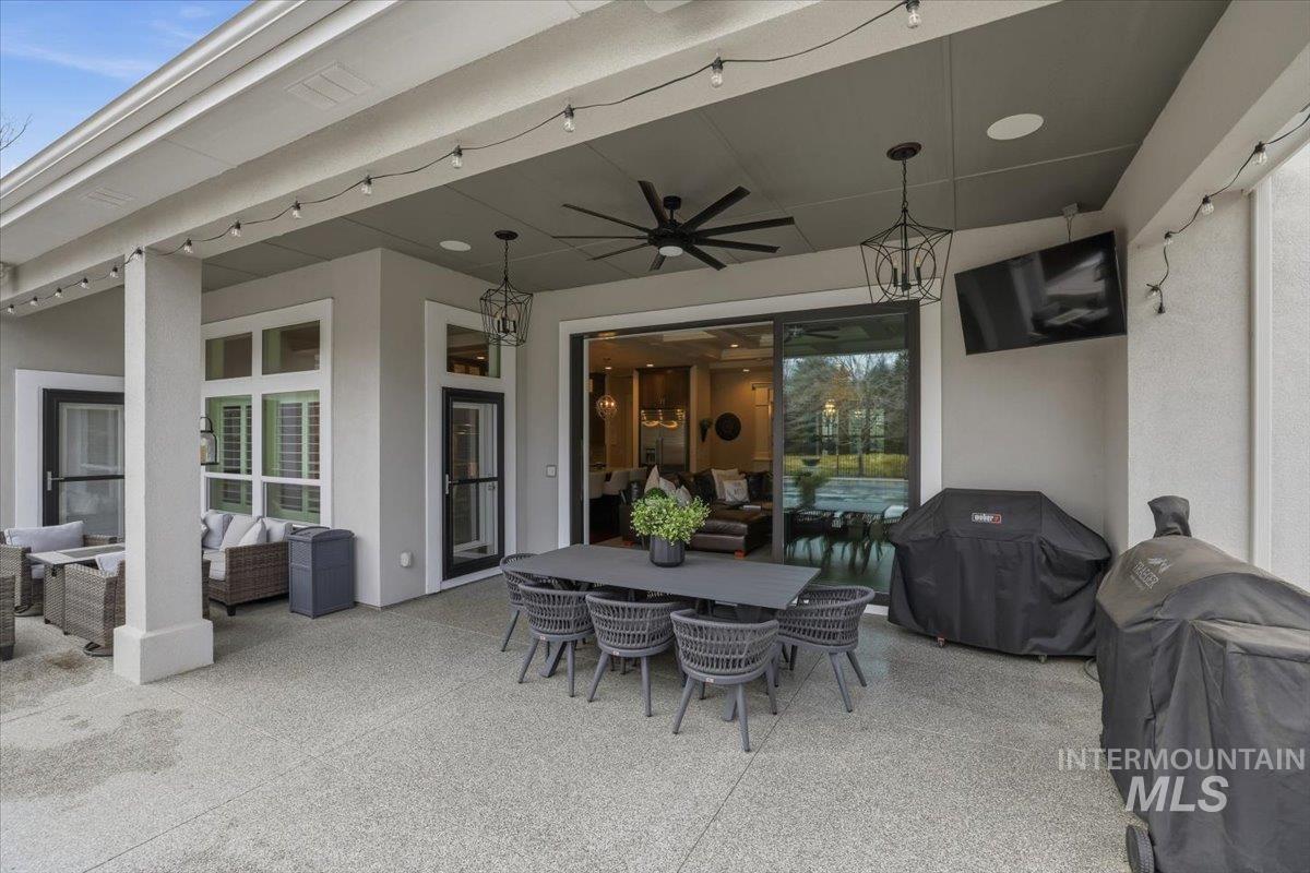 6590 North Fairborn Avenue Meridian, ID 83646 - Photo 6 of 49 View of patio featuring outdoor lounge area, outdoor dining area, grilling area, and ceiling fan
