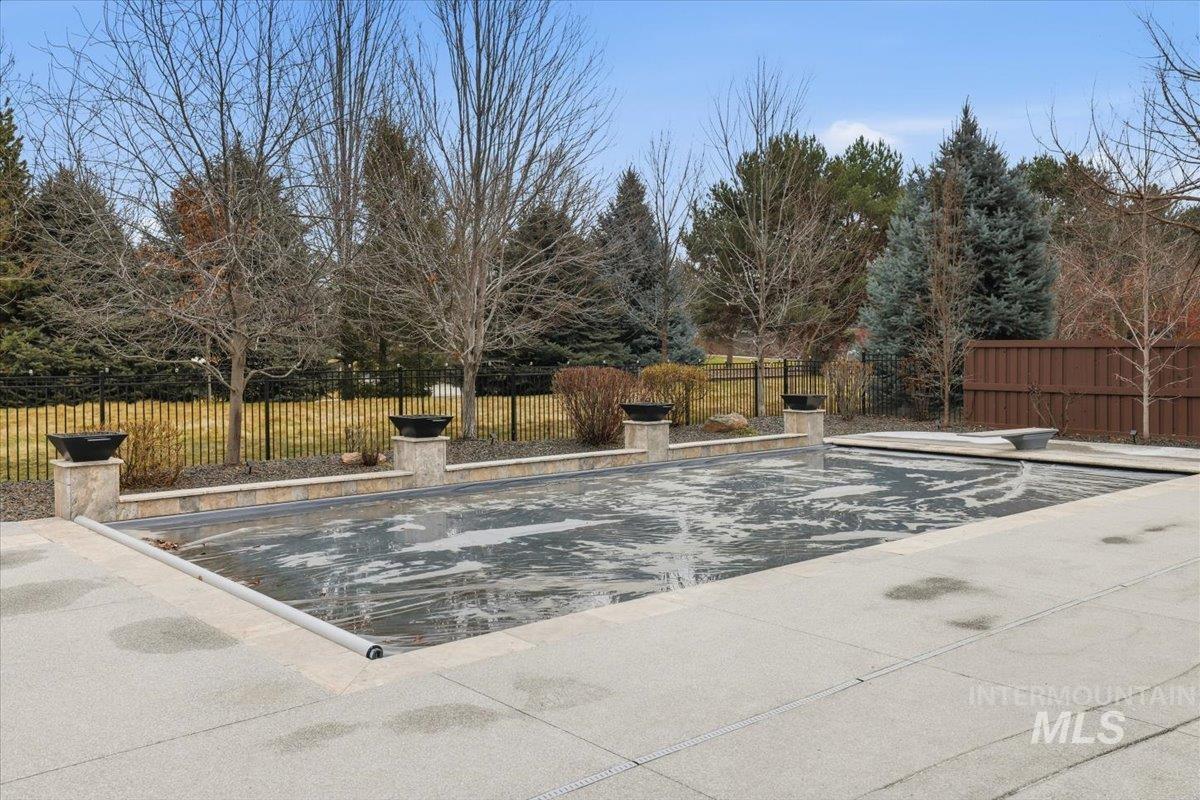 6590 North Fairborn Avenue Meridian, ID 83646 - Photo 8 of 49 View of pool featuring a fenced backyard and a patio
