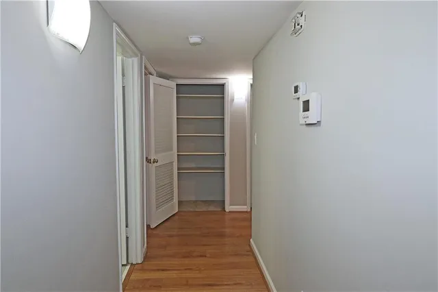 a bathroom with a shower and a toilet