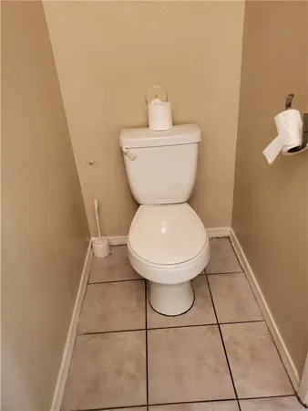 a bathroom with a toilet and a sink