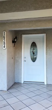 a view of a hallway with entryway