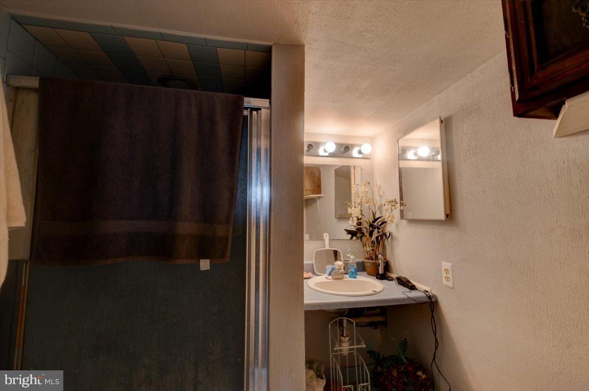 7306 Dogwood Road Baltimore, MD 21244 - Photo 19 of 37 Cozy bathroom with modern touches.