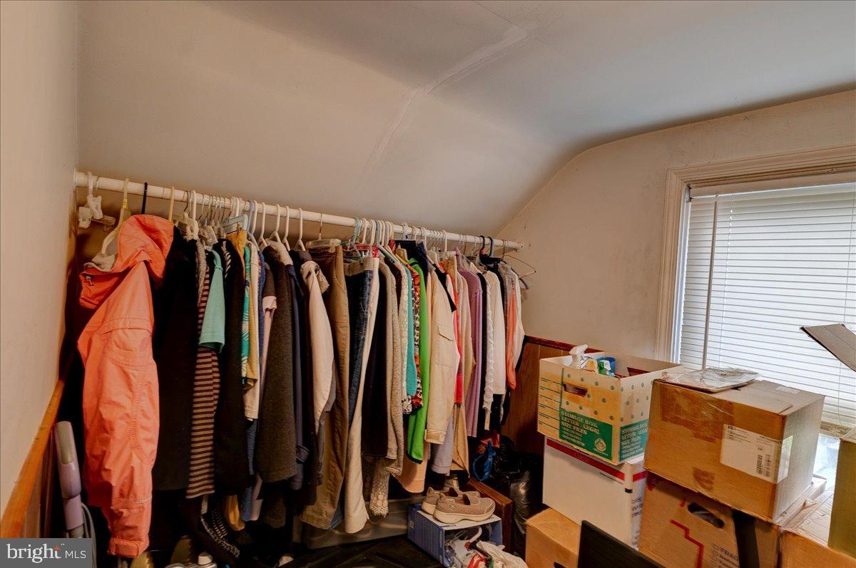 7306 Dogwood Road Baltimore, MD 21244 - Photo 27 of 37 Cozy nook filled with vibrant clothing.