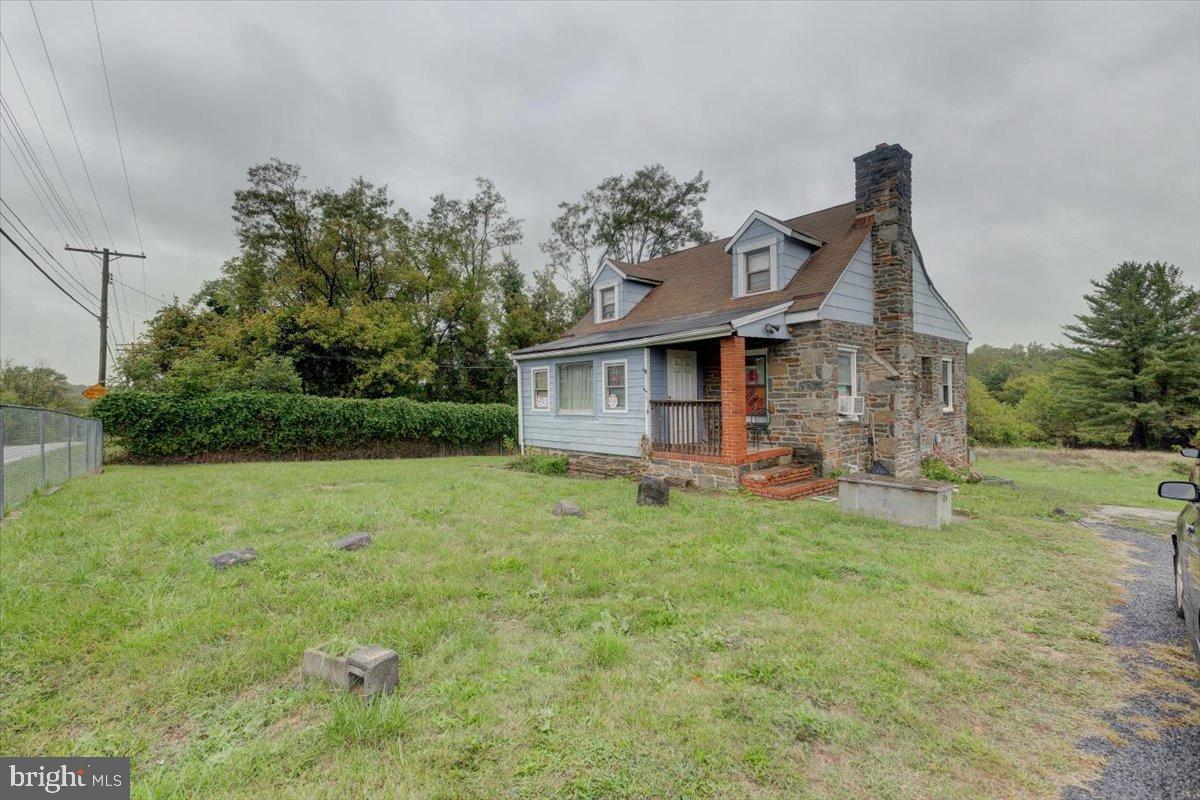 7306 Dogwood Road Baltimore, MD 21244 - Photo 4 of 37 Charming stone cottage on spacious lot.