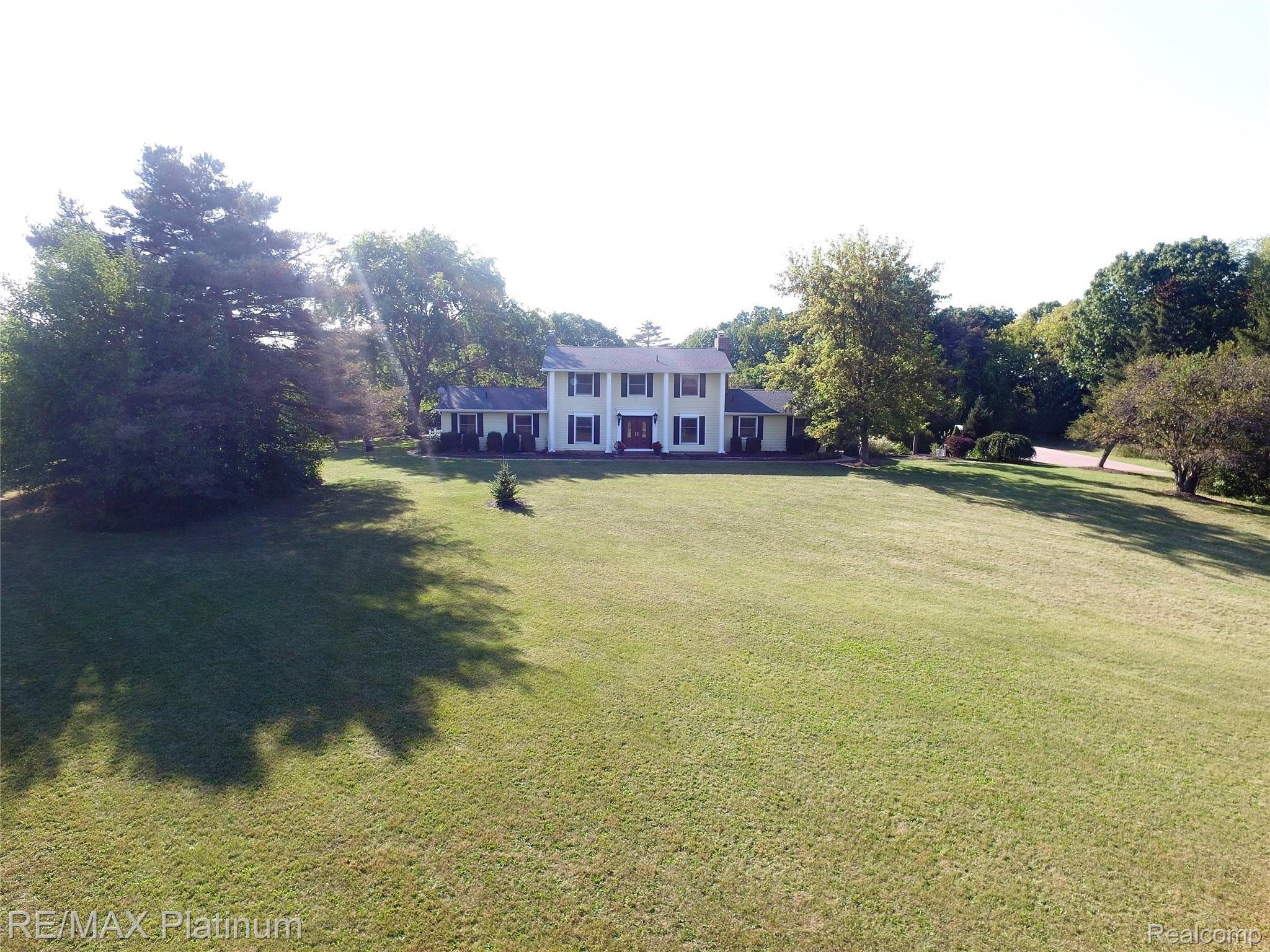 7525 Fisher Road Howell, MI 48855 - Photo 51 of 54 front house drone .JPG