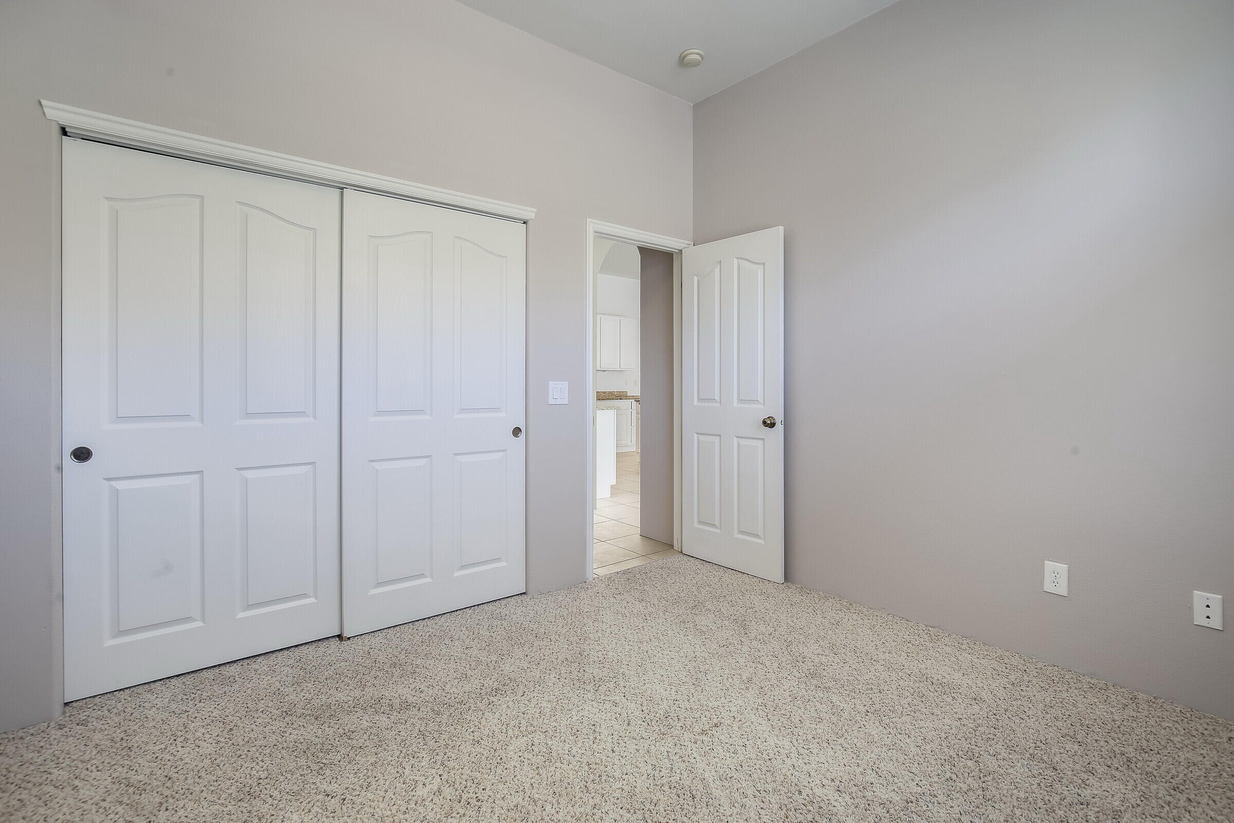 10748 Ocotillo Road Desert Hot Springs, CA 92240 - Photo 19 of 28 a view of an empty room