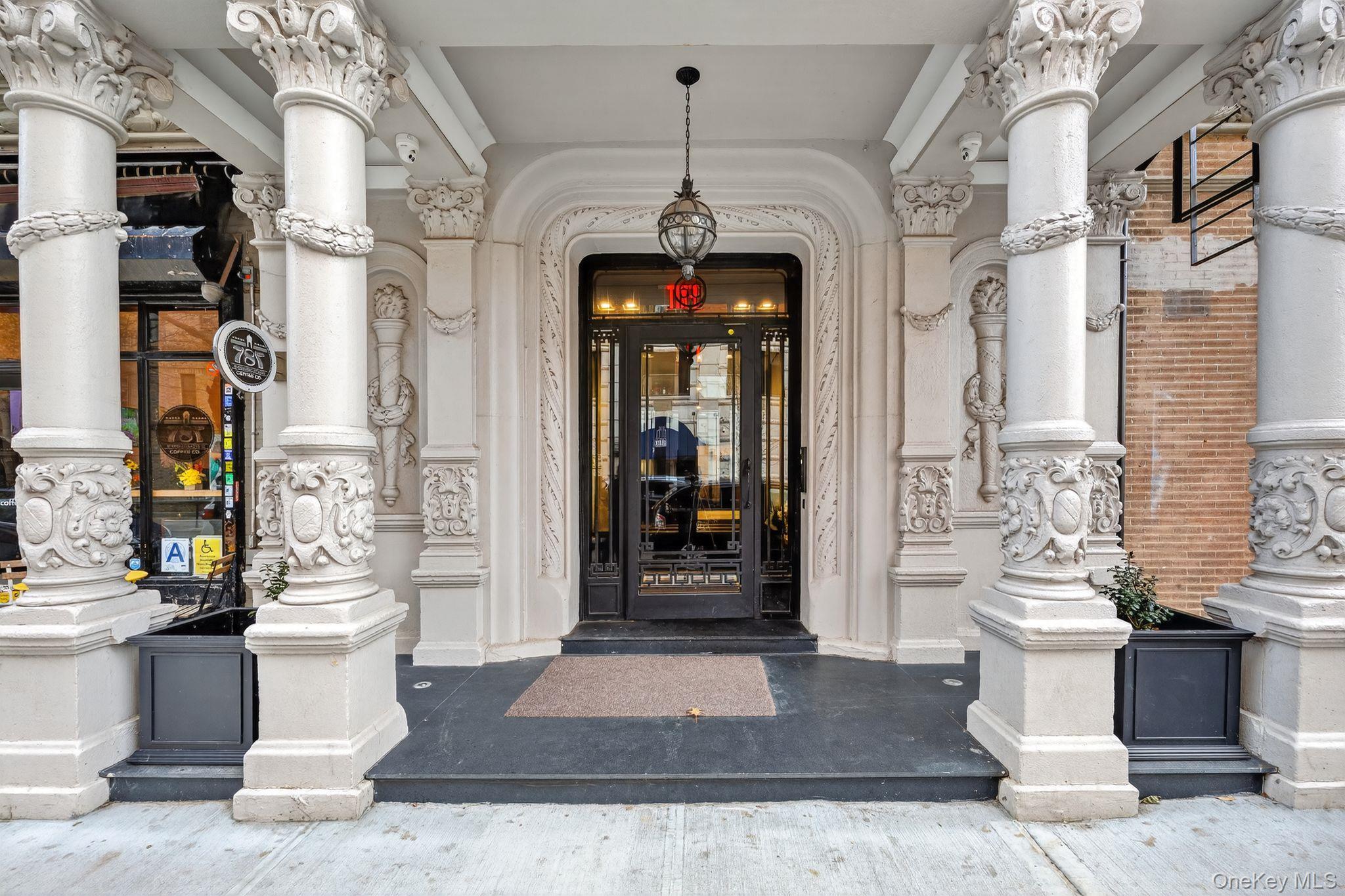 60 West 129th Street, Unit 409 Manhattan, NY 10027 - Photo 16 of 17 a front view of a house with a porch