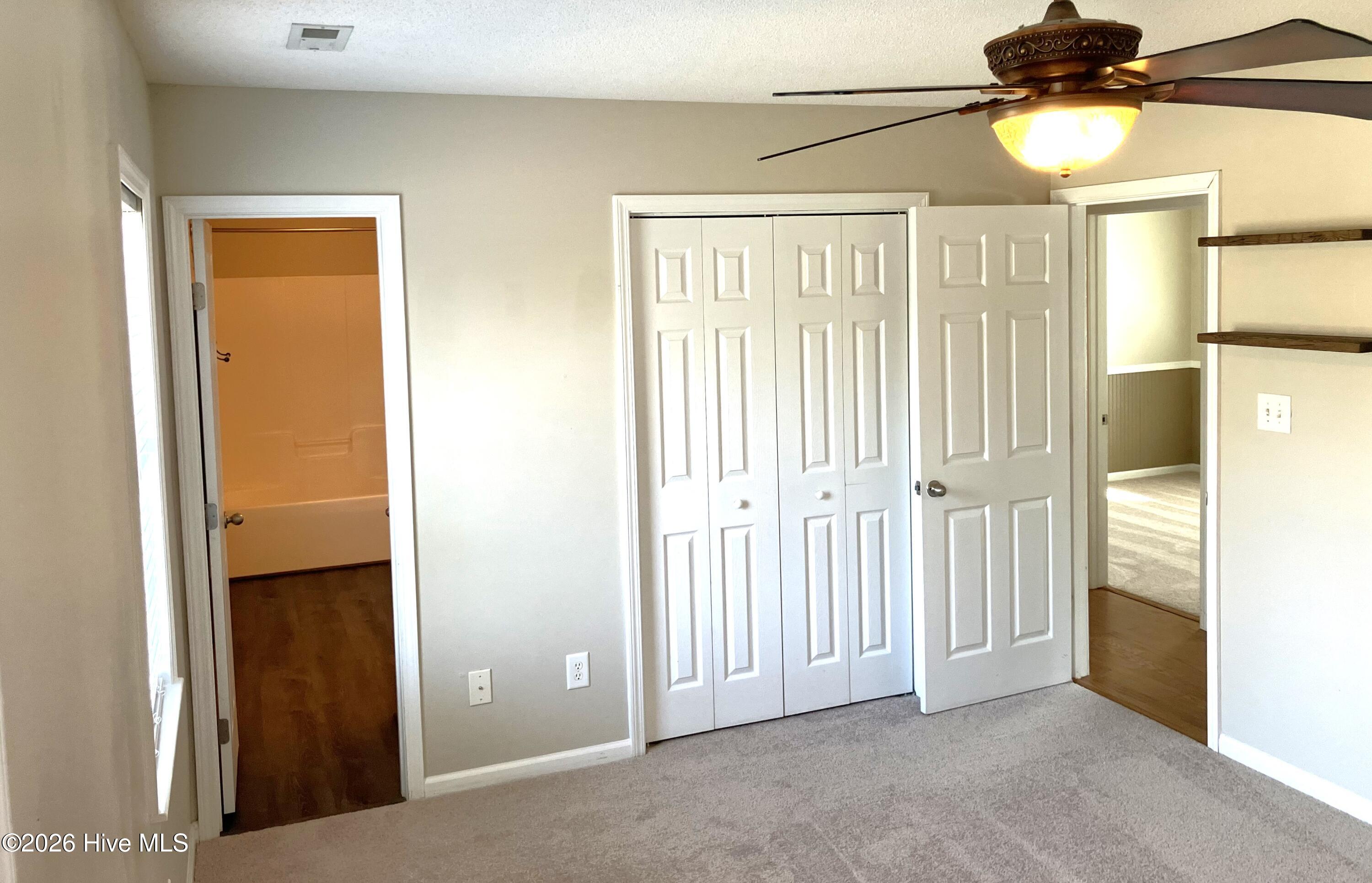 102 Poplar Ridge Road Jacksonville, NC 28546 - Photo 16 of 33 His & Her master closets