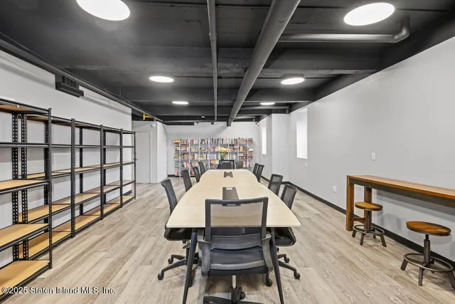 a view of a chairs and table in a room