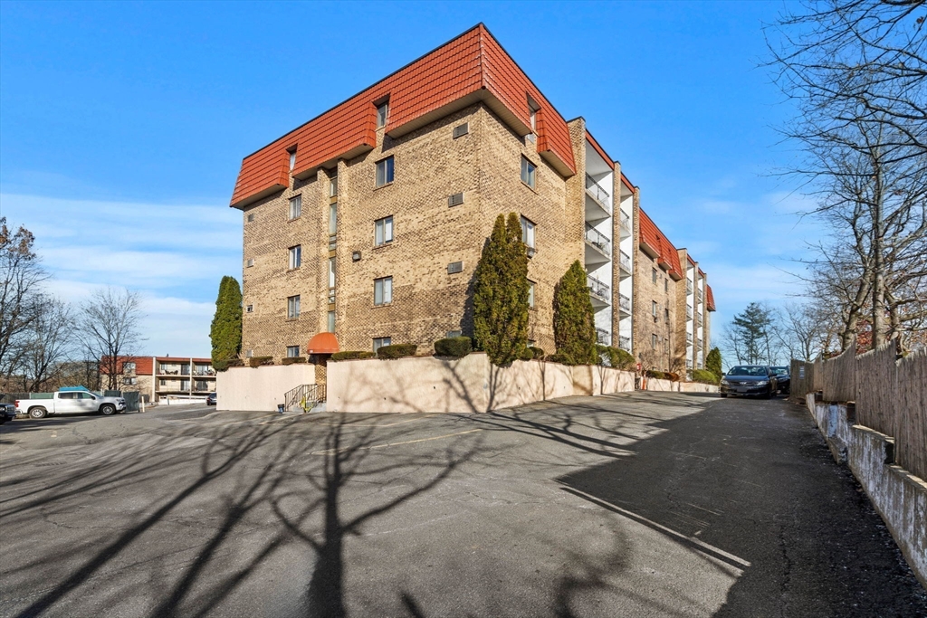 a view of a building with a street