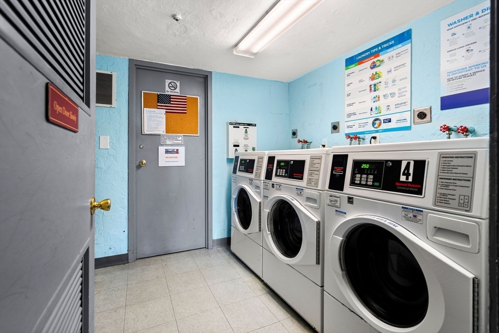 159 Franklin Street, Unit E6 Stoneham, MA 02180 - Photo 20 of 22 a utility room with dryer and washer