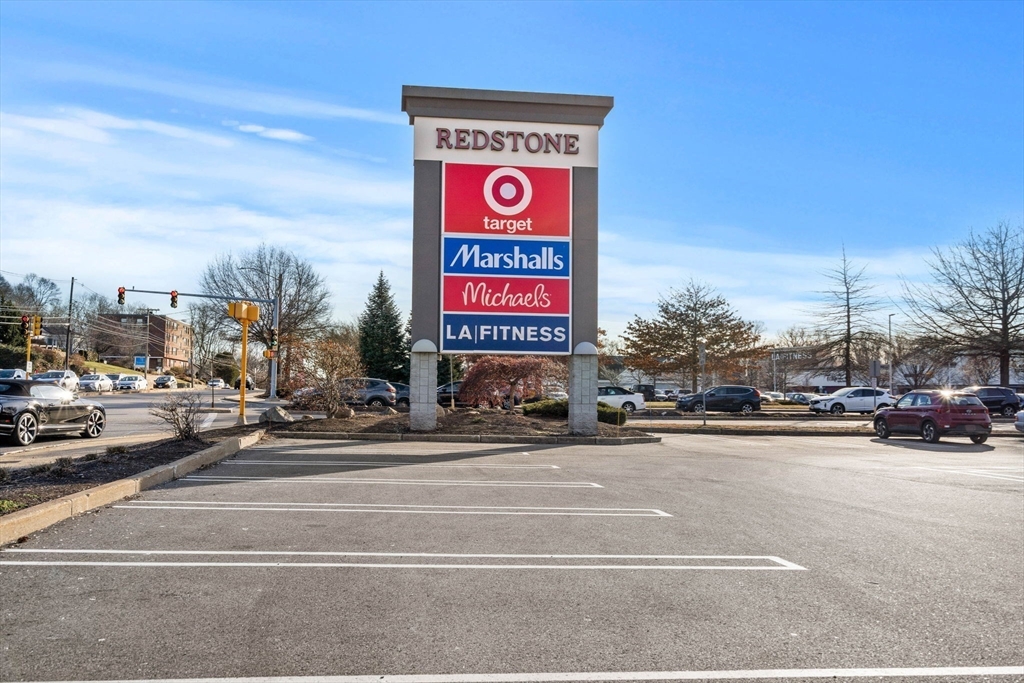 159 Franklin Street, Unit E6 Stoneham, MA 02180 - Photo 22 of 22 a view of a street with cars