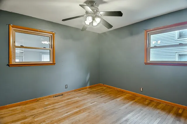 a view of a room with a large window