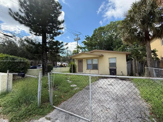 a house view with a garden space